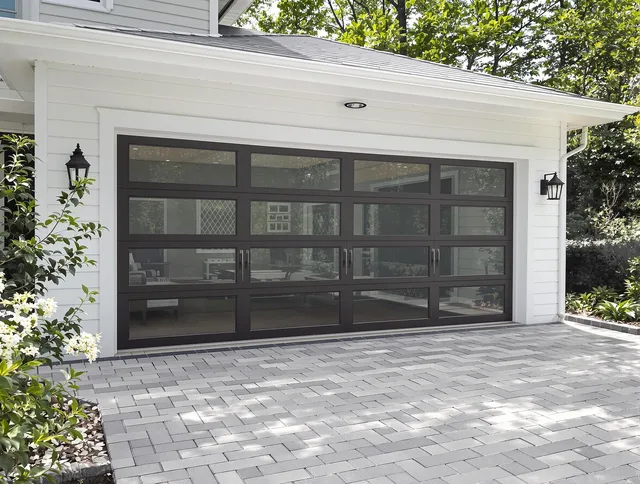 Garden City Garage Door Repair design specialist presenting custom garage door options to Garden City homeowner