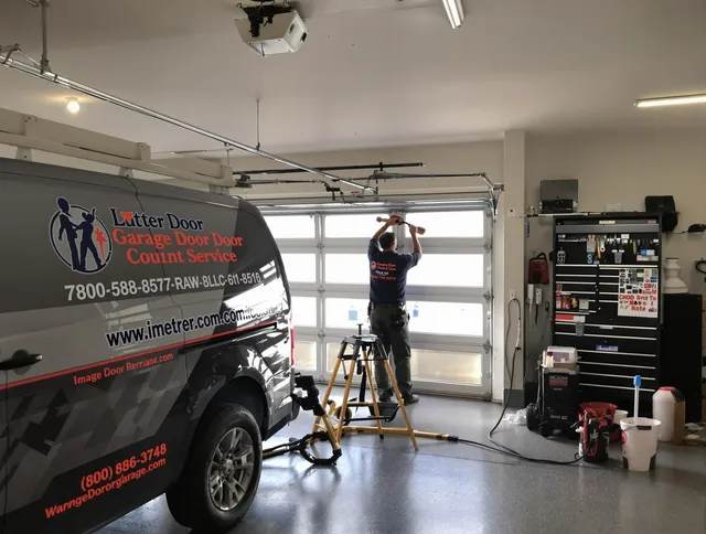 Garden City Garage Door Repair team performing same-day garage door repair in Garden City
