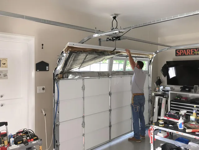 Garage door section replacement by Garden City Garage Door Repair in Garden City